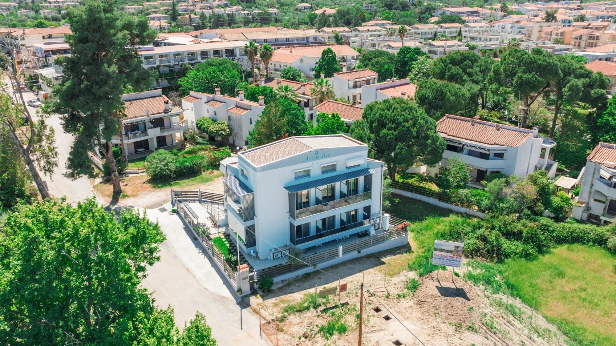 Artemida Suites Hanioti Bagian luar foto
